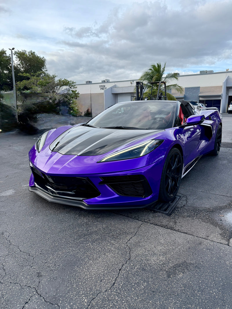 2021 Corvette C8 Midnight purple on Red convertible - three quarter front - purple corvette c8