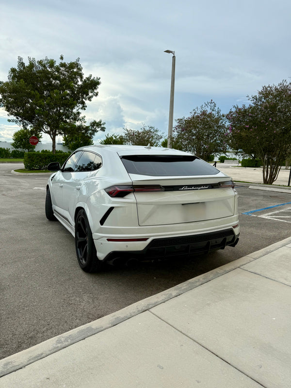 2020 Lambo Urus white panda with stars ✨ - three quarter rear - white lamborghini urus