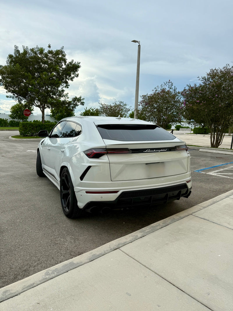 2020 Lambo Urus white panda with stars ✨ - three quarter rear - white lamborghini urus