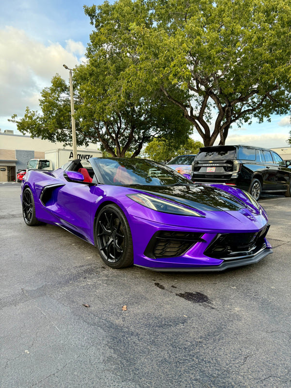 2021 Corvette C8 Midnight purple on Red convertible - three quarter front - purple corvette c8
