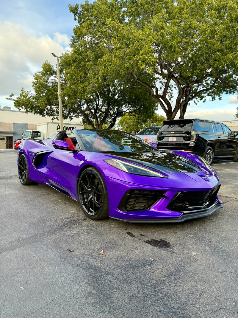 2021 Corvette C8 Midnight purple on Red convertible - three quarter front - purple corvette c8