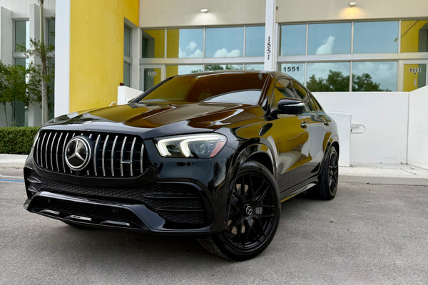 2023 Mercedes GLE53 Black on red - three quarter front - black mercedes gle53