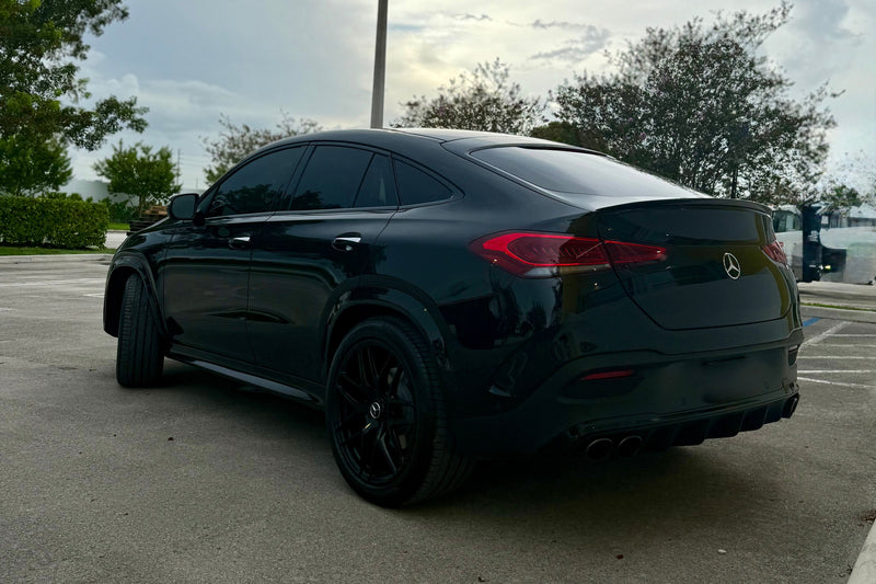 2023 Mercedes GLE53 Black on red - three quarter rear - black mercedes gle53