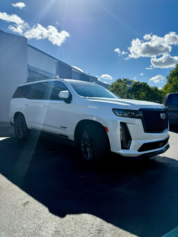 2023 Escalade V panda - three quarter front - white cadillac escalade-v