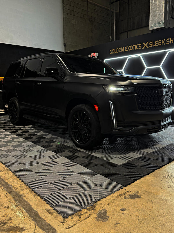 2023 Cadillac Escalade Satin Black w Stars ✨ - three quarter front - black cadillac escalade