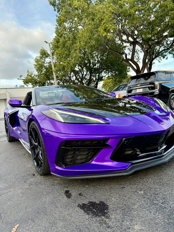 2021 Corvette C8 Midnight purple on Red convertible - three quarter front - purple corvette c8