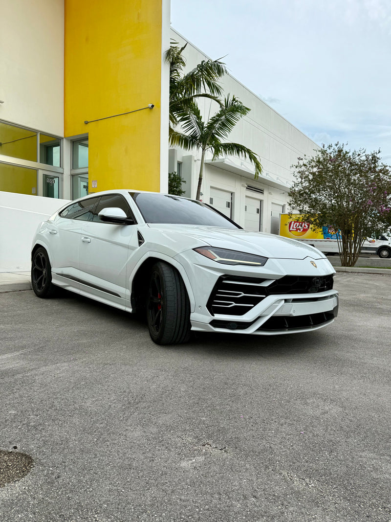 2020 Lambo Urus white panda with stars ✨ - three quarter front - white lamborghini urus