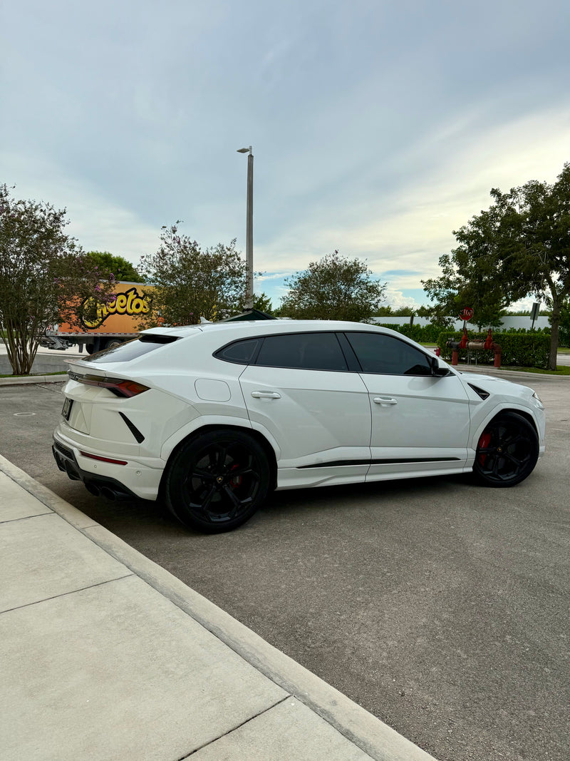 2020 Lambo Urus white panda with stars ✨ - three quarter rear - white lamborghini urus