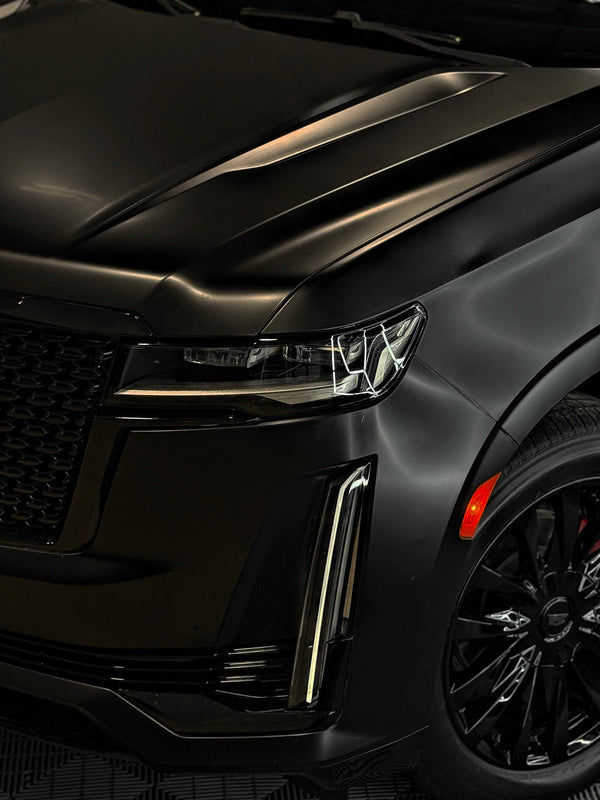2023 Cadillac Escalade Satin Black w Stars ✨ - three quarter front - black cadillac escalade