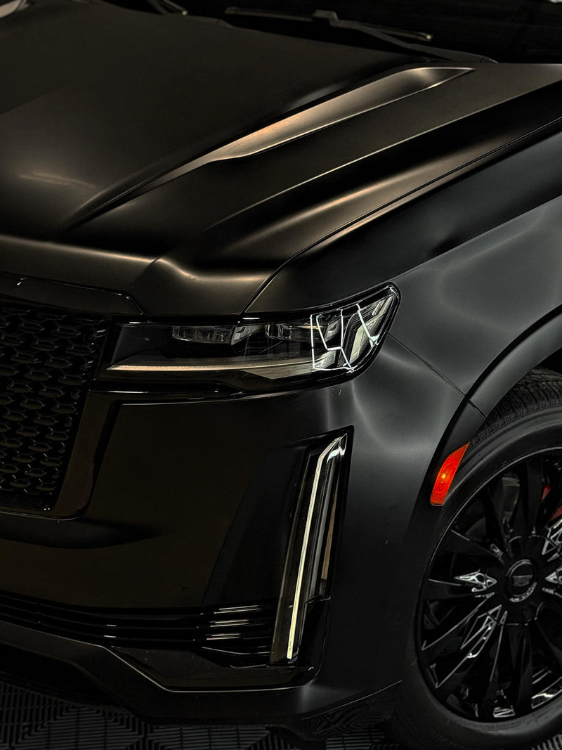 2023 Cadillac Escalade Satin Black w Stars ✨ - three quarter front - black cadillac escalade