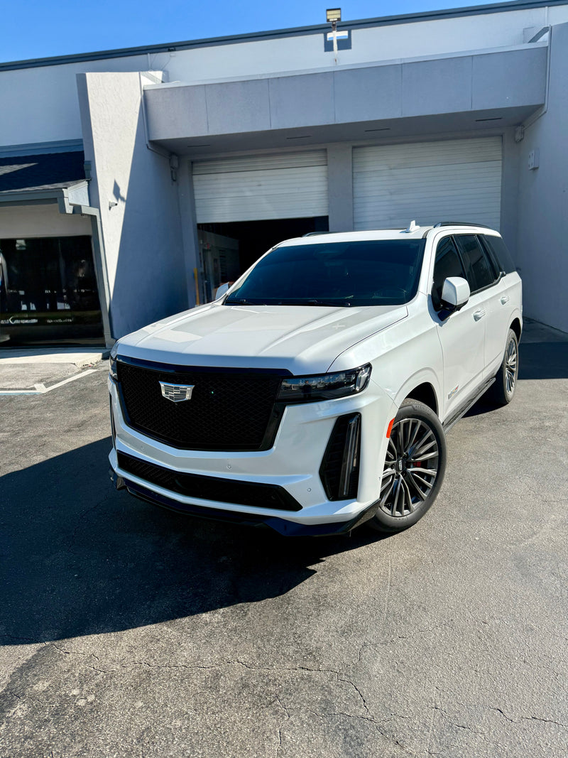 2023 Escalade V panda - three quarter front - white cadillac escalade-v