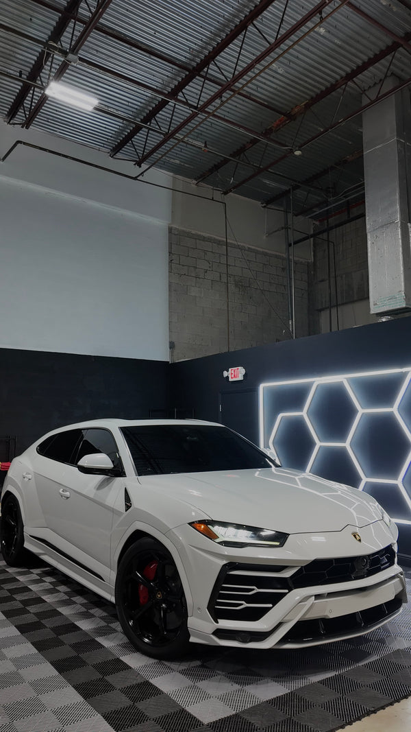2020 Lambo Urus white panda with stars ✨ - three quarter front - white lamborghini urus