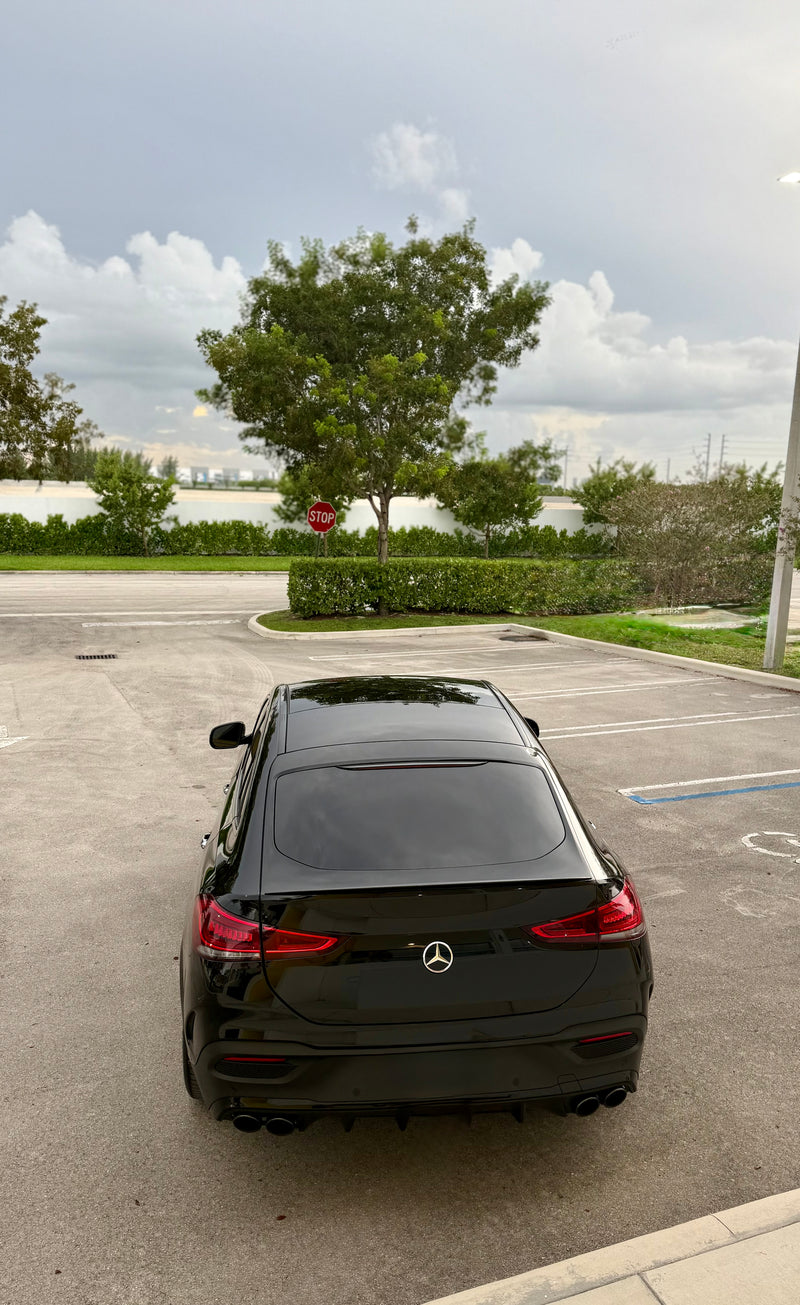 2023 Mercedes GLE53 Black on red - three quarter rear - black mercedes gle53