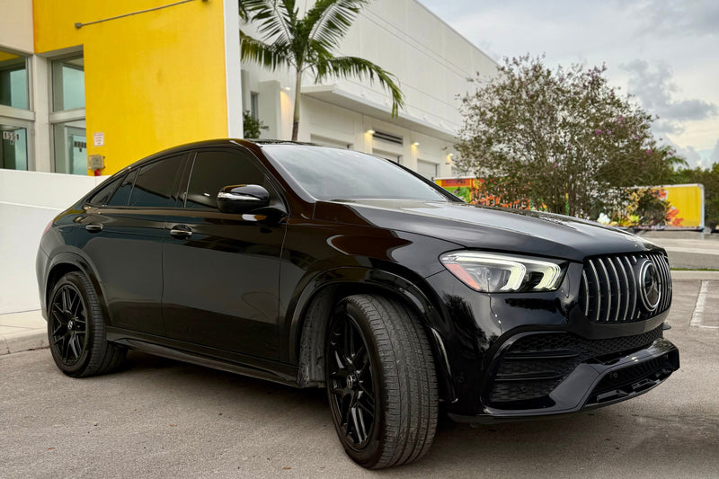 2023 Mercedes GLE53 Black on red - three quarter front - black mercedes gle53