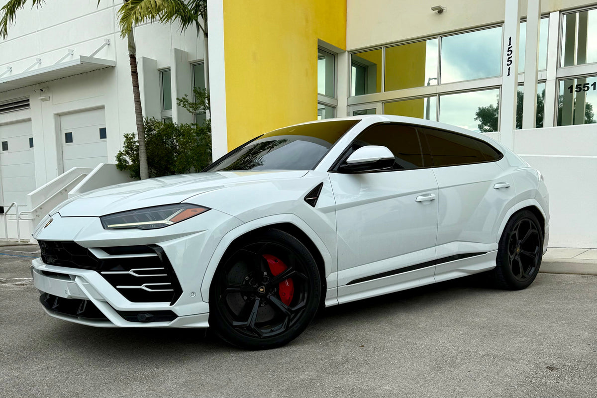 2020 Lambo Urus white panda with stars ✨ - three quarter front - white lamborghini urus