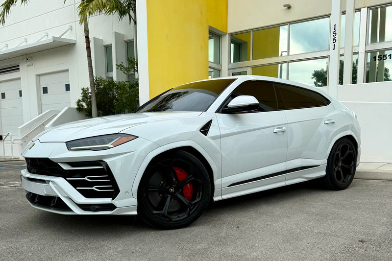 2020 Lambo Urus white panda with stars ✨ - three quarter front - white lamborghini urus