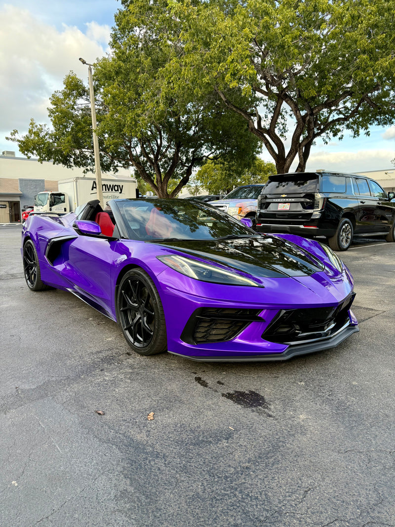 2021 Corvette C8 Midnight purple on Red convertible - three quarter front - purple corvette c8