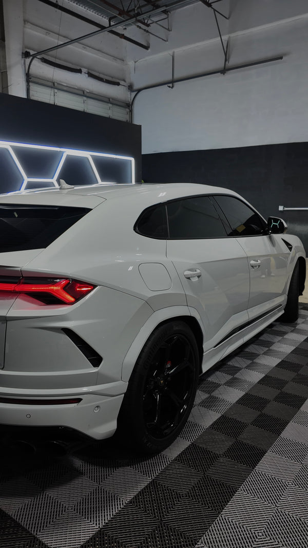 2020 Lambo Urus white panda with stars ✨ - three quarter rear - white lamborghini urus