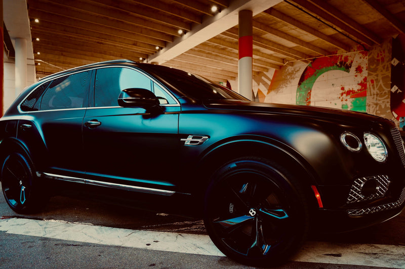 2018 Bentley Bentayga - Bentley Rental Tampa - three quarter front - black bentley bentayga