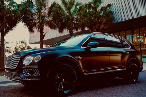 2018 Bentley Bentayga - Bentley Rental Tampa - three quarter front - black bentley bentayga
