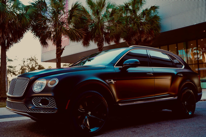2018 Bentley Bentayga - Bentley Rental Tampa - three quarter front - black bentley bentayga