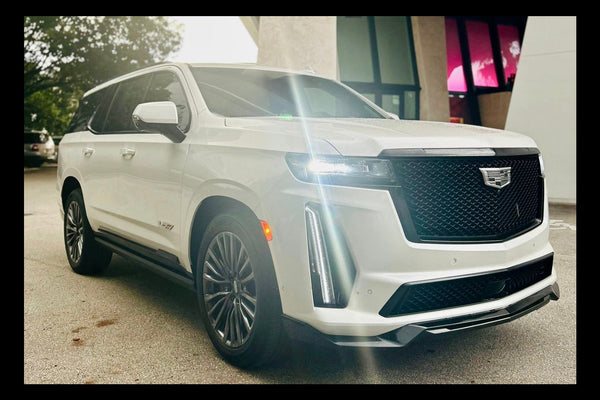 2023 Escalade V panda - three quarter front - white cadillac escalade-v