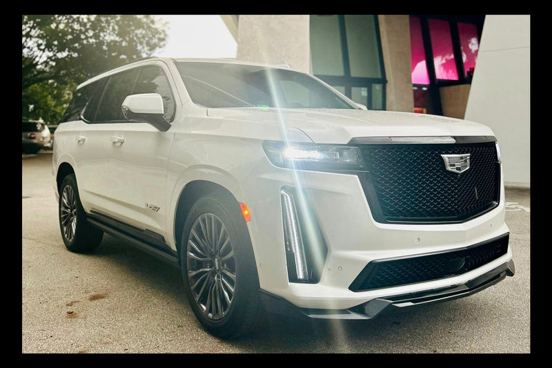 2023 Escalade V panda - three quarter front - white cadillac escalade-v