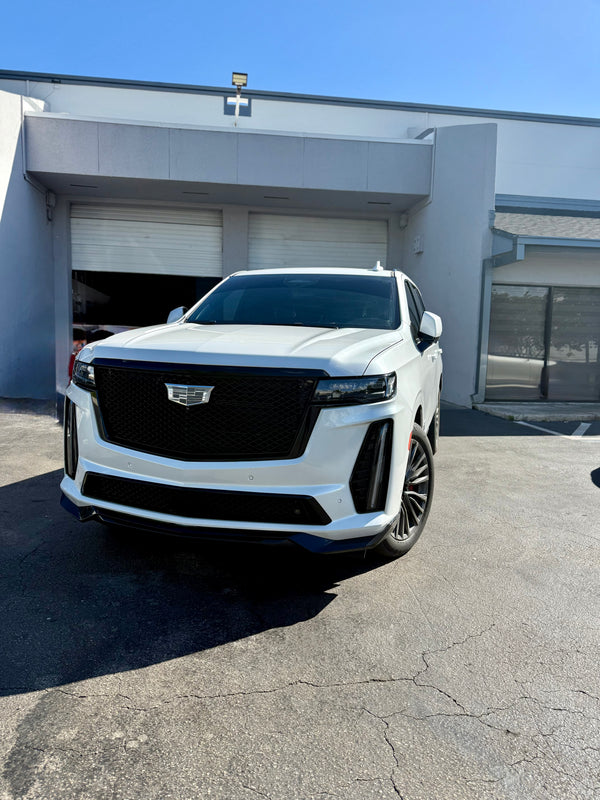 2023 Escalade V panda - three quarter front - white cadillac escalade-v