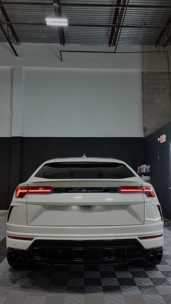 2020 Lambo Urus white panda with stars ✨ - rear - white lamborghini urus