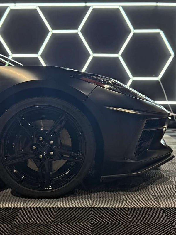 2023 Corvette C8 Satin Black convertible - three quarter front - black corvette c8