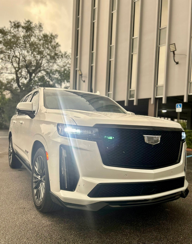 2023 Escalade V panda - three quarter front - white cadillac escalade-v